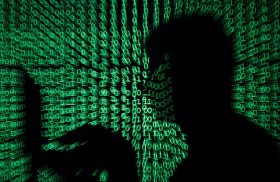 a man with a computer