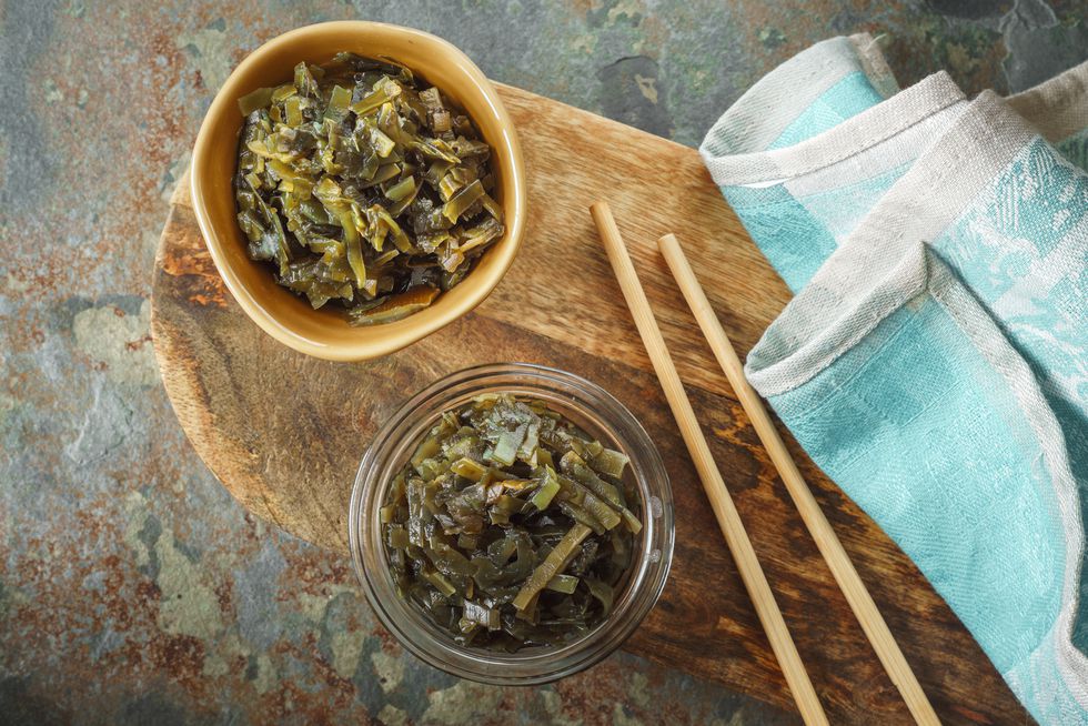 seaweed-in-bowls-on-a-wooden-cutting-board-royalty-free-image-636735200-1539874936