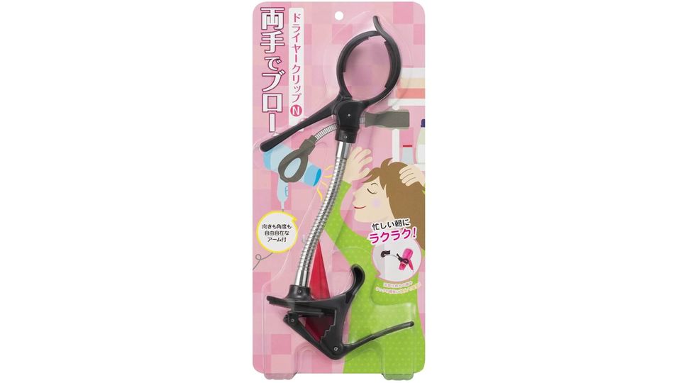 いろいろな場所にドライヤーを固定できるクリップ式ホルダー。両手が空いて快適