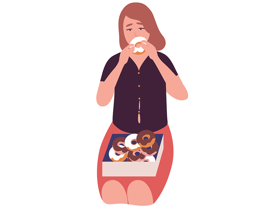 ドーナツを食べる女性